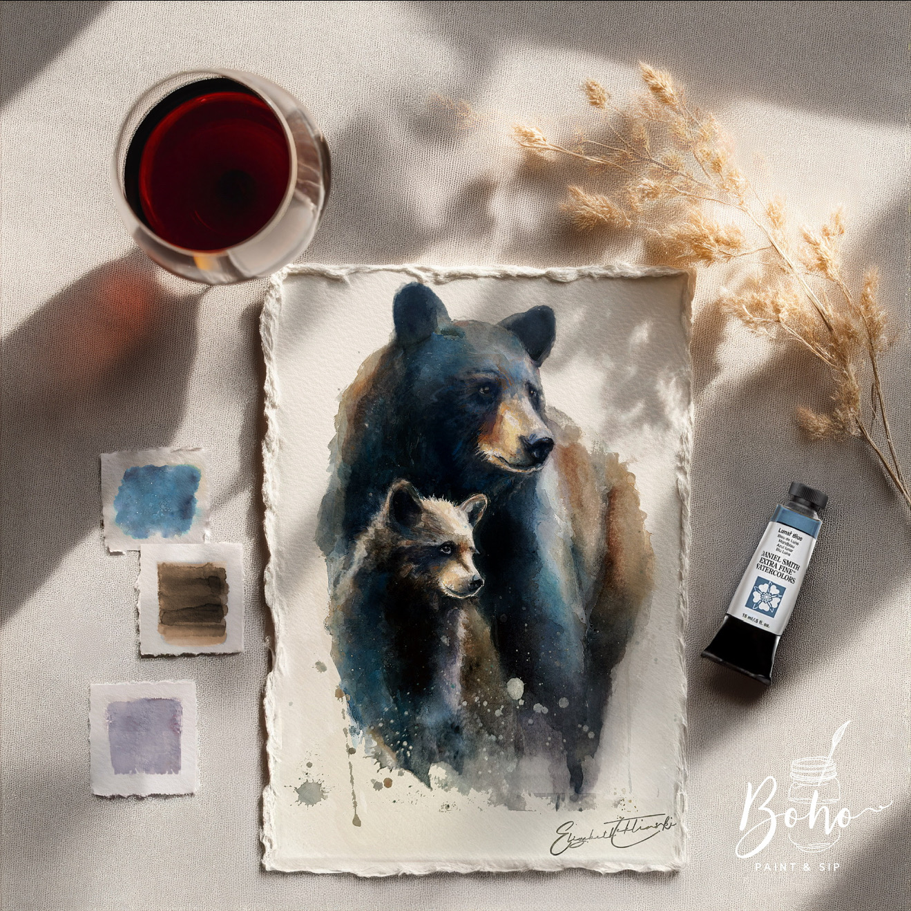 Mother and cub watercolor by Elizabeth Teklinski, shown with prepared paint colors and a brush